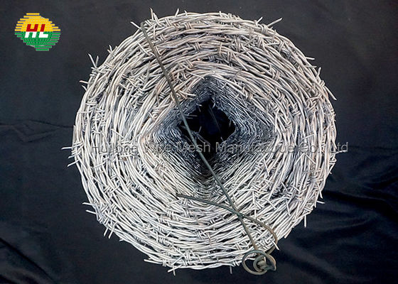Hot Dipped 12 Gauge Galvanized Iron Barbed Wire On Fence Top